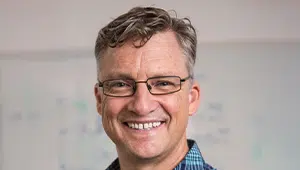 Photo of Dr Aron Downie.